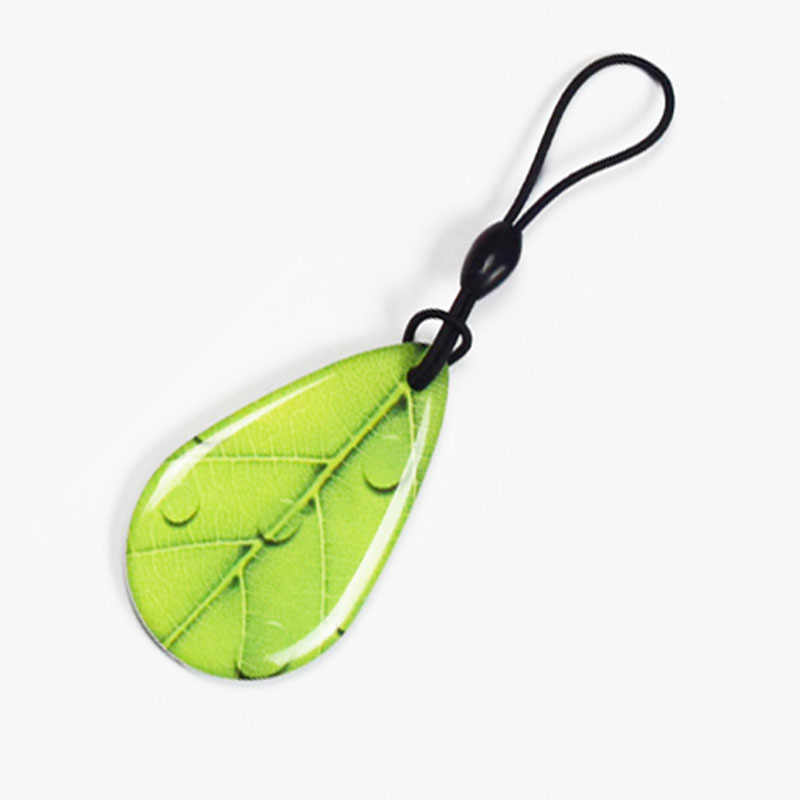 அலுவலகங்கள் மற்றும் குடியிருப்பு கட்டிடங்களுக்கான பாதுகாப்பை RFID கீ ஃபோப்ஸ் எவ்வாறு மேம்படுத்துகிறது?